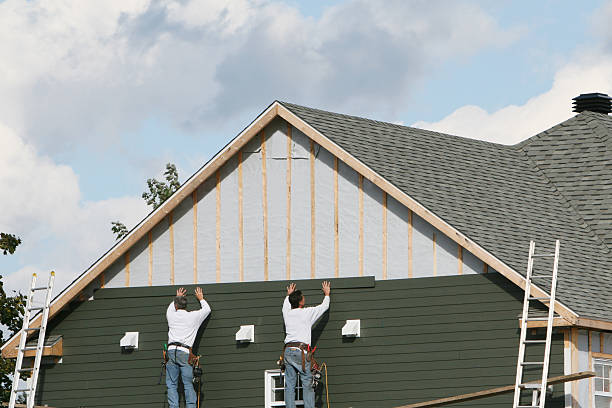 Professional Siding Replacement technician working in Auburndale, MA